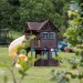 Play area with slide, swings, trampoline and Denis the Dexta